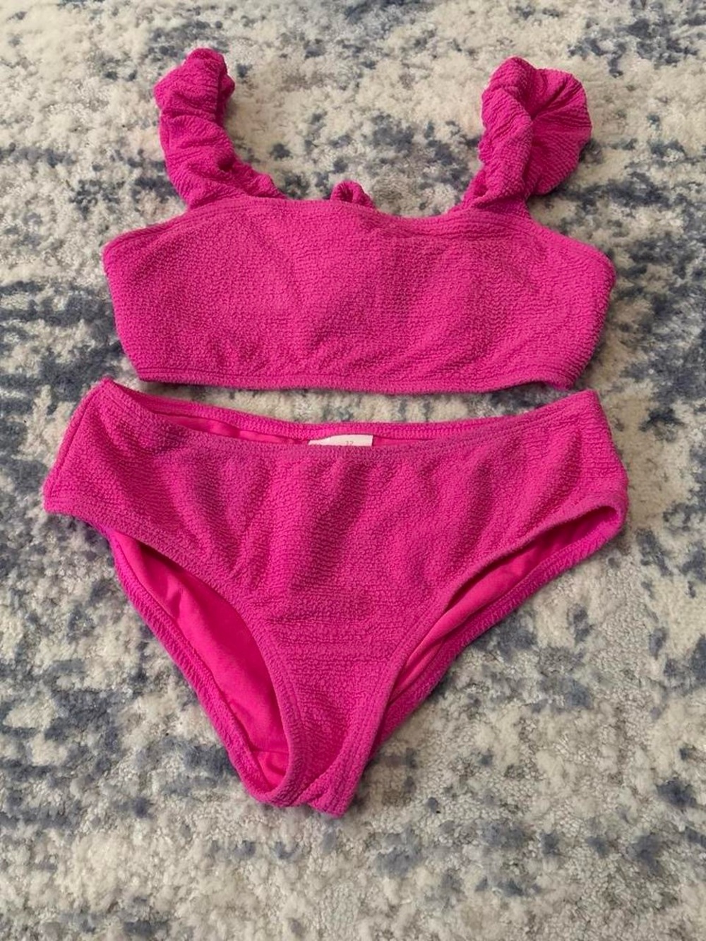 Pink bikini set with ruffled straps